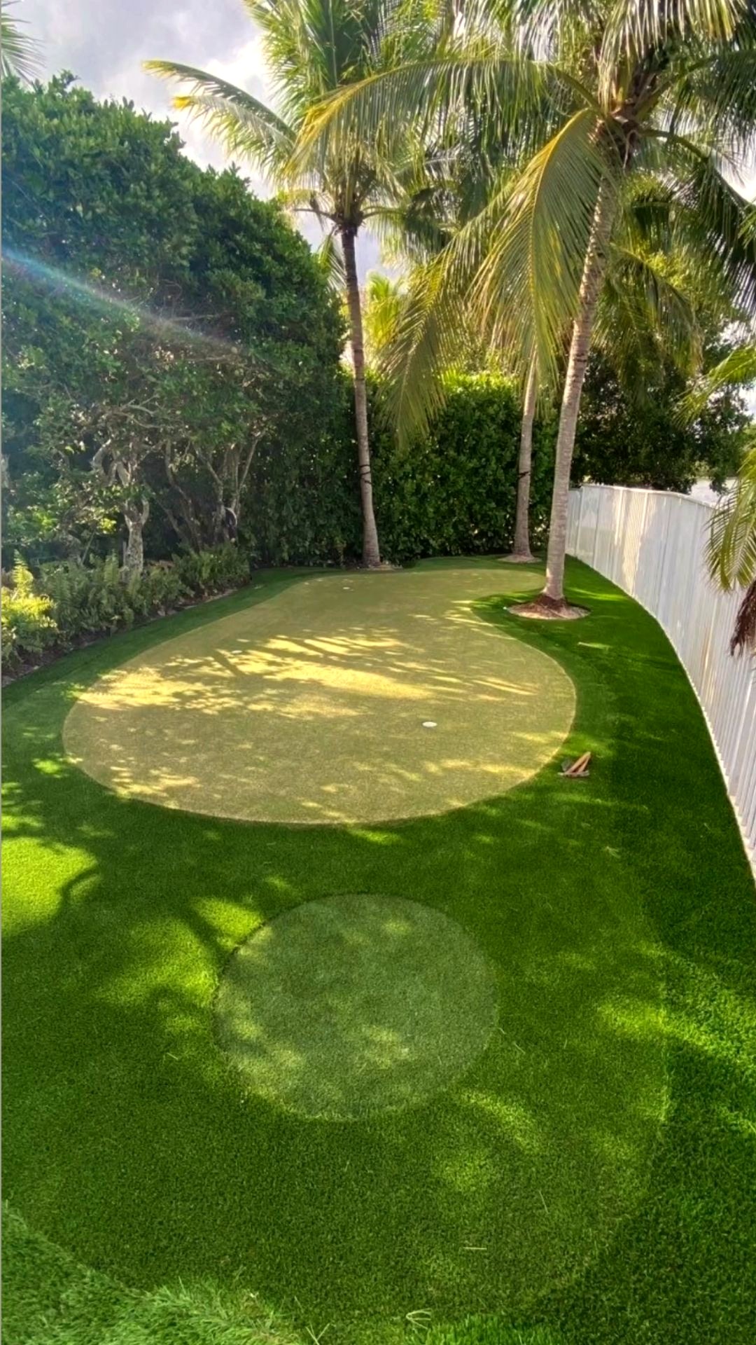Private putting green with palm trees — SuperGrass golf green Costa del Sol