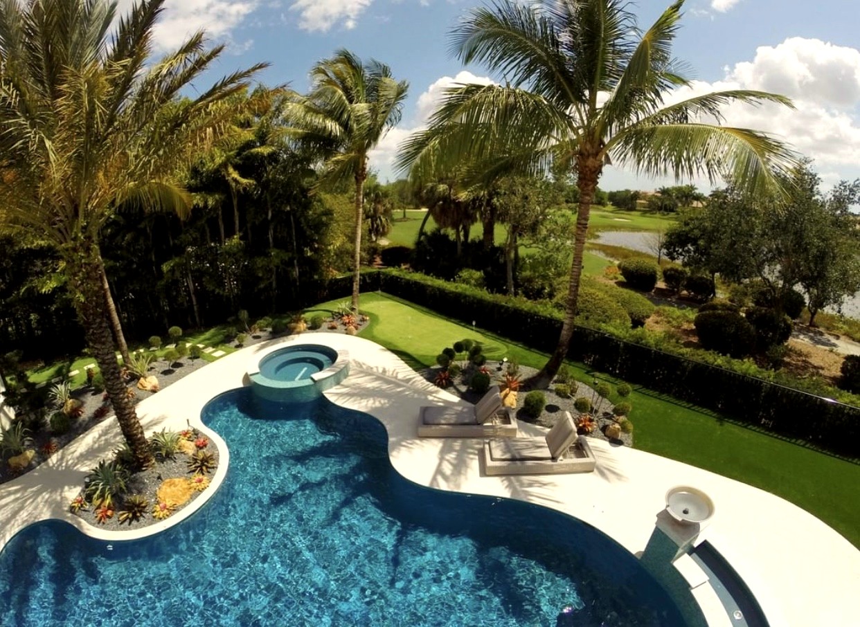 Luxury villa putting green next to pool — private golf green Marbella