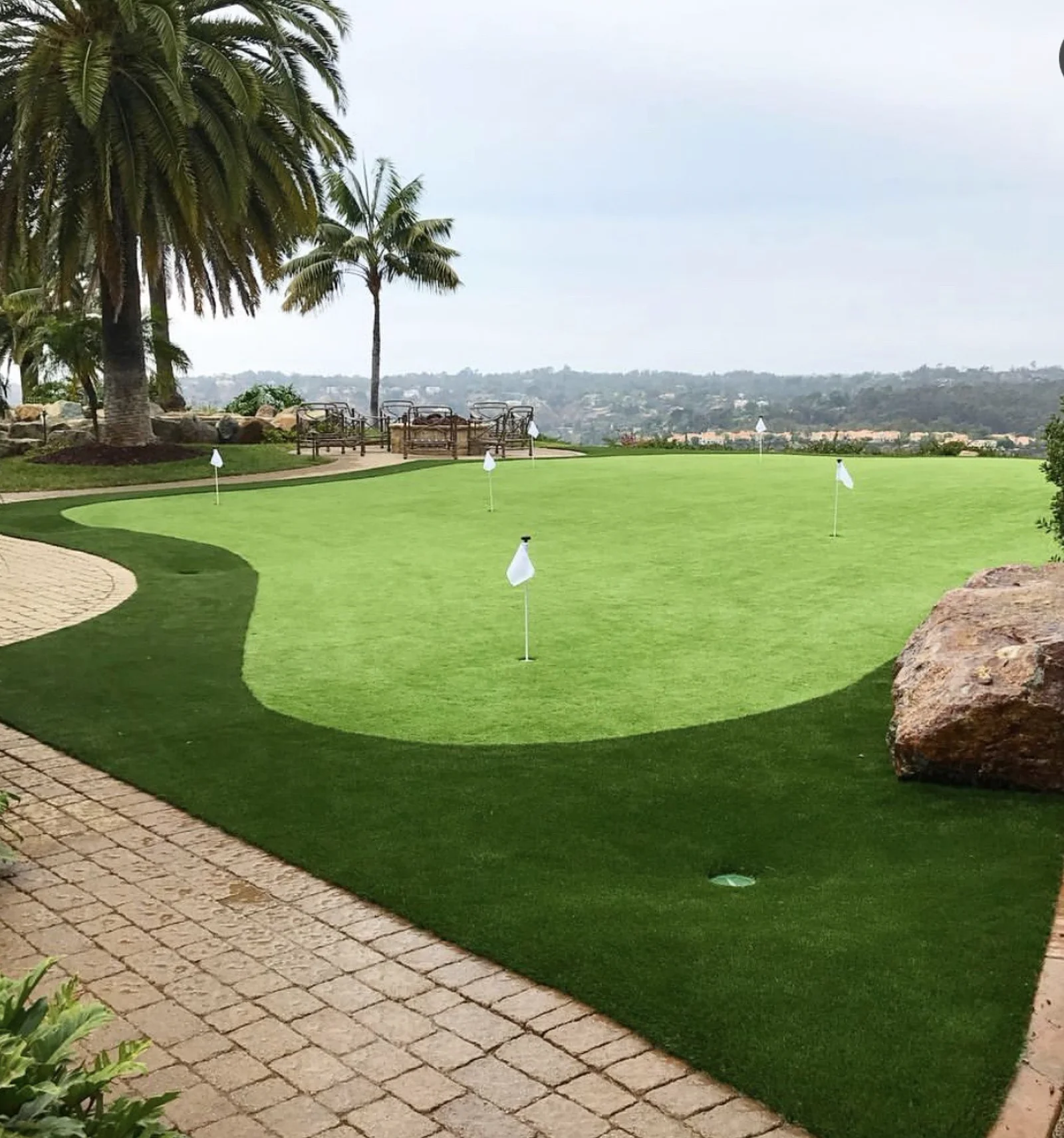 Practice putting green with flags at a Costa del Sol clubhouse
